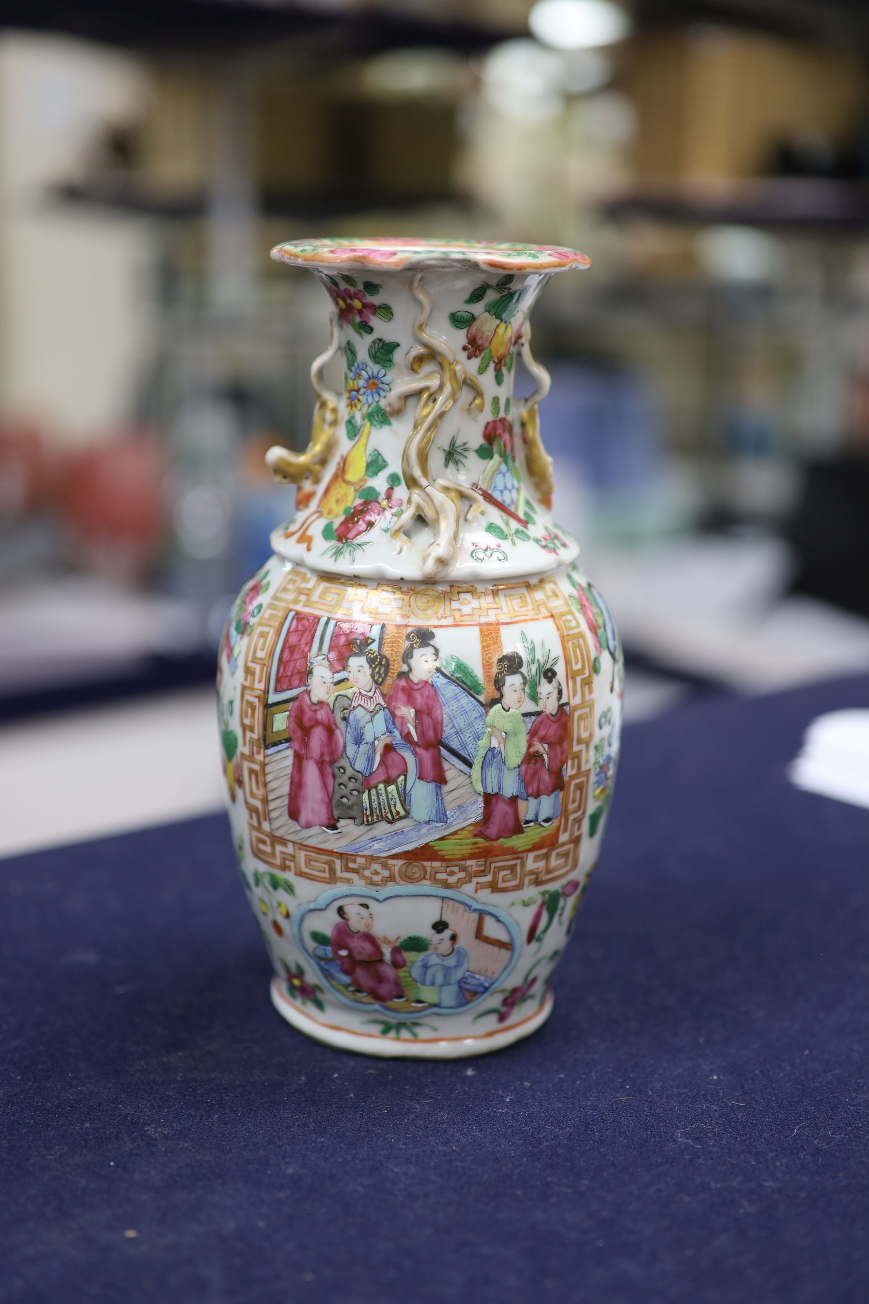 A Chinese famille verte jar and cover and a Canton famille rose vase, tallest 22cm